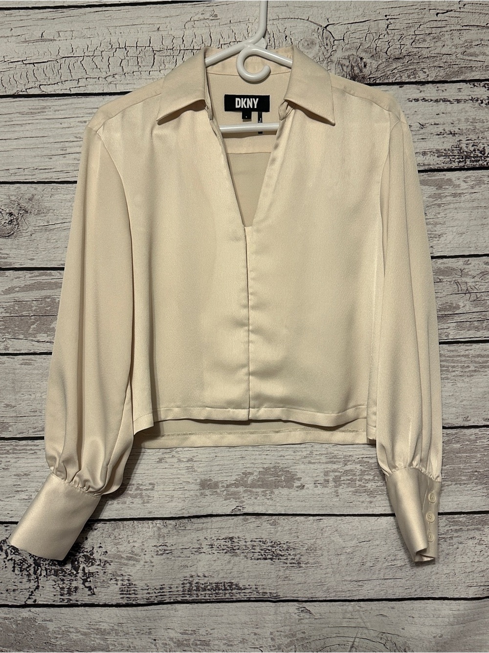 DKNY Ivory V‑Neck Cropped Blouse with Notched Collar